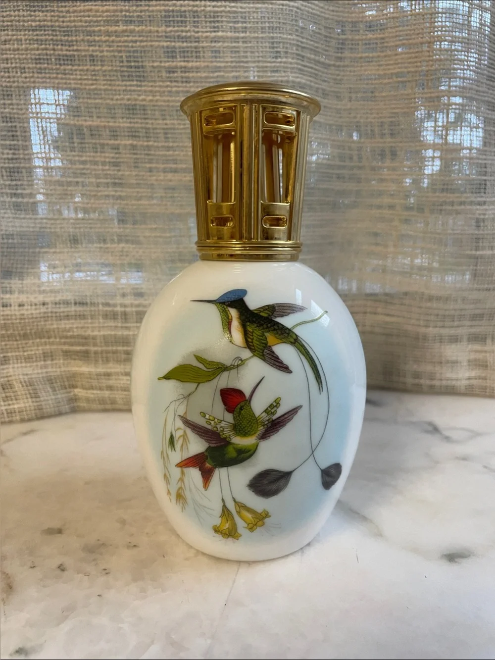 a vintage Lampe Berger Limoges Porcelain Hummingbird Fragrance Lamp
